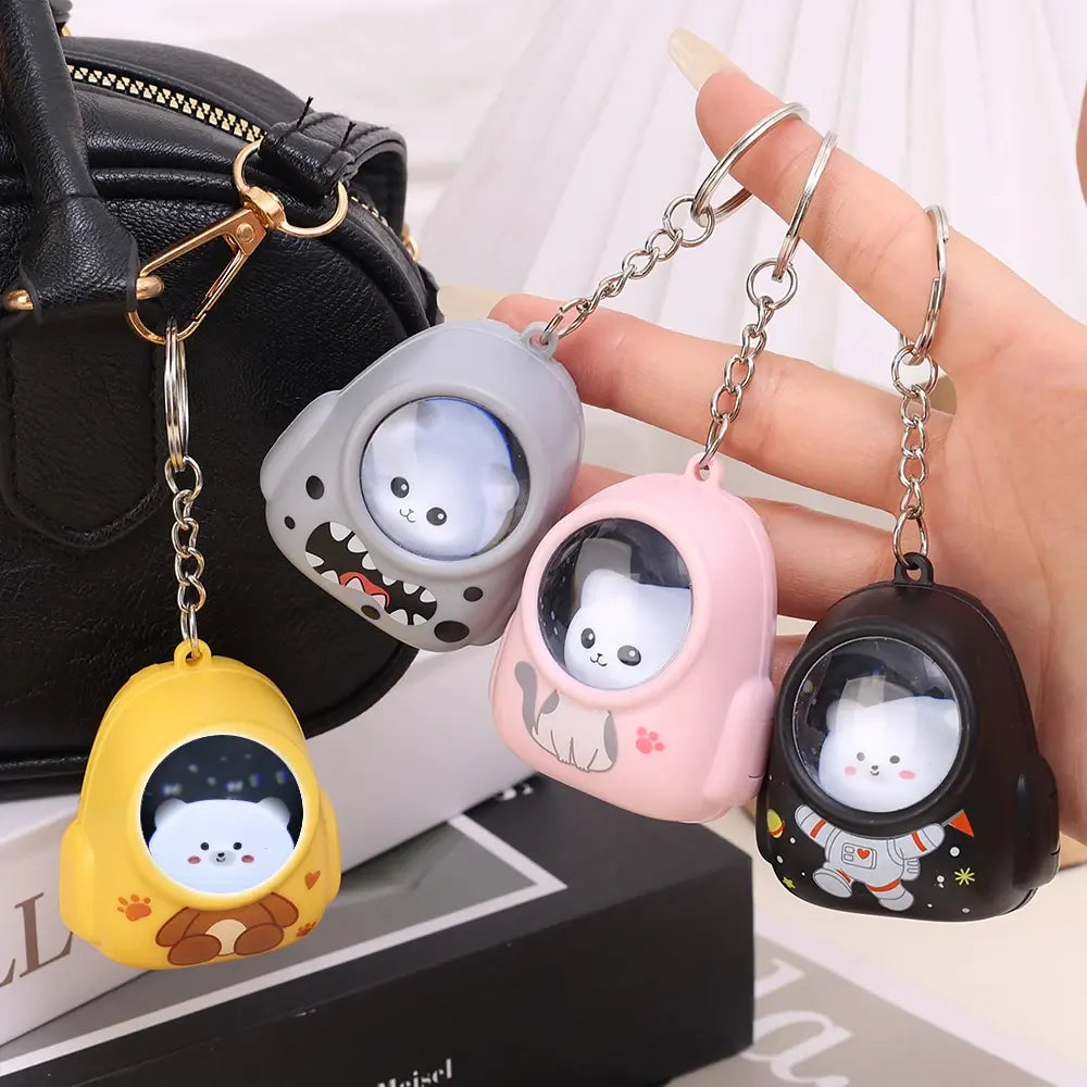 Luminous Capybara Space Capsule Keychain - Glow-in-the-Dark Cartoon Capibala Keyring for Backpacks & Gifts